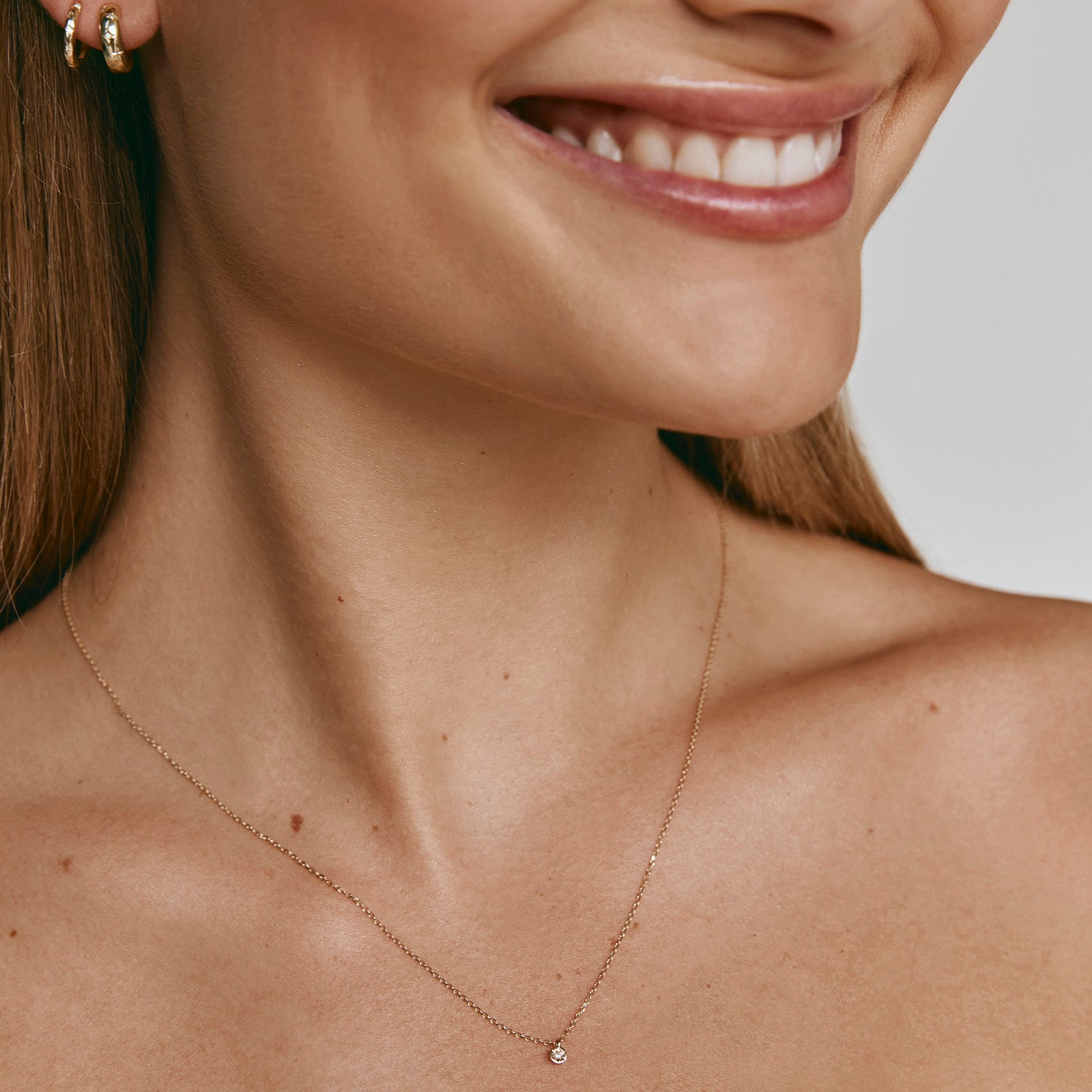 14K GOLD DIAMOND STARBURST NECKLACE